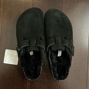 Brand new black Birkenstocks with fur inside. US women size 10. Never worn